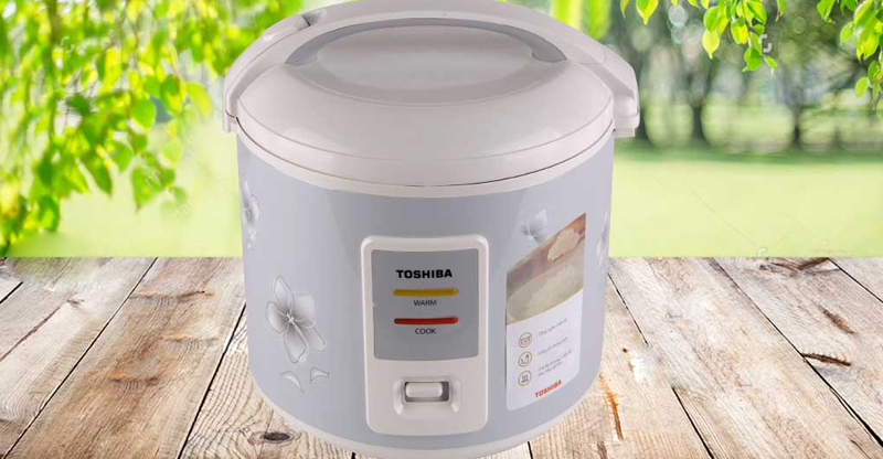 Để nấu cháo, bấm nút "Cook" trên nồi cơm điện Toshiba RC-18JFM2(H)VN.